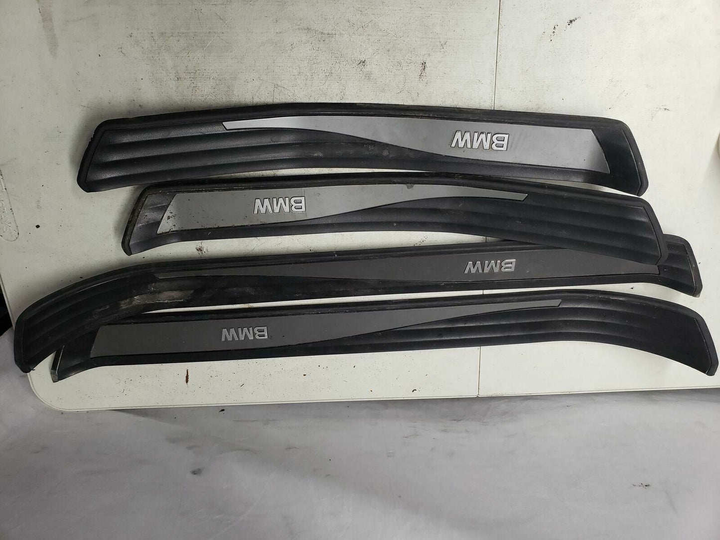 BMW E60 FRONT AND BACK RIGHT & LEFT PASSENGER DRIVER DOOR SILL TRIMS SET